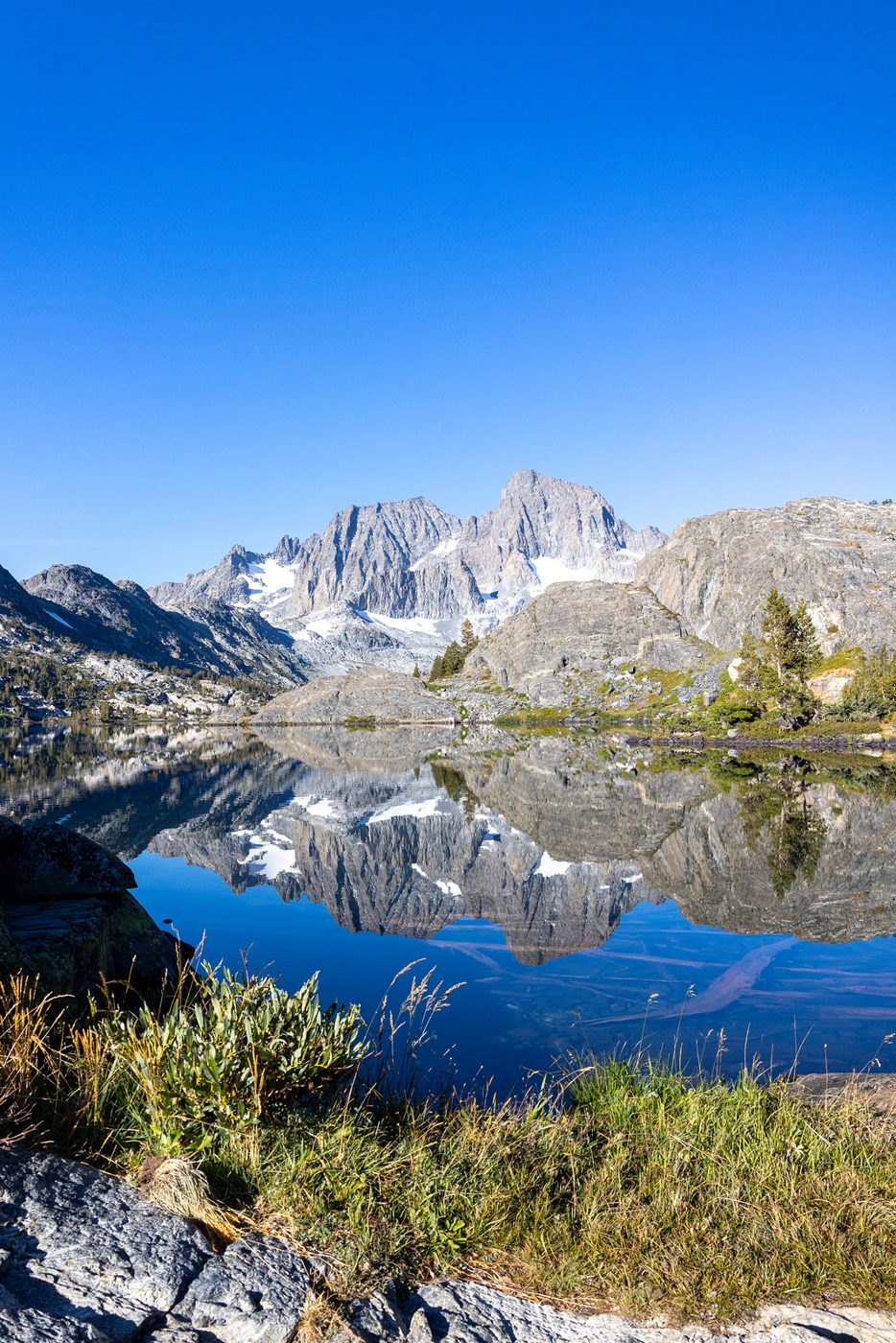 Ritter Range over a lake.